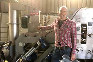 Alex Culpin preparing the cider belt press