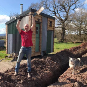 Alex at work on the plumbing for The Cider Shack