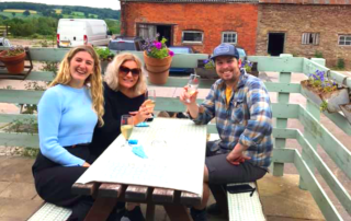 Happy cider lovers at the Ty Gwyn Cider shop